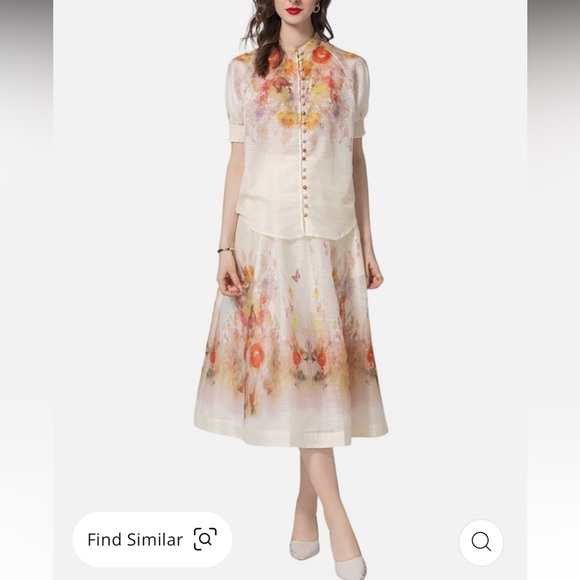 BURRYCO 2 piece shirt and skirt set floral design and sheer. New with tags.